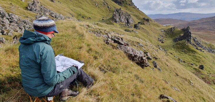 Artist Liz Myhill sat on the hillside at Rahoy Hills.