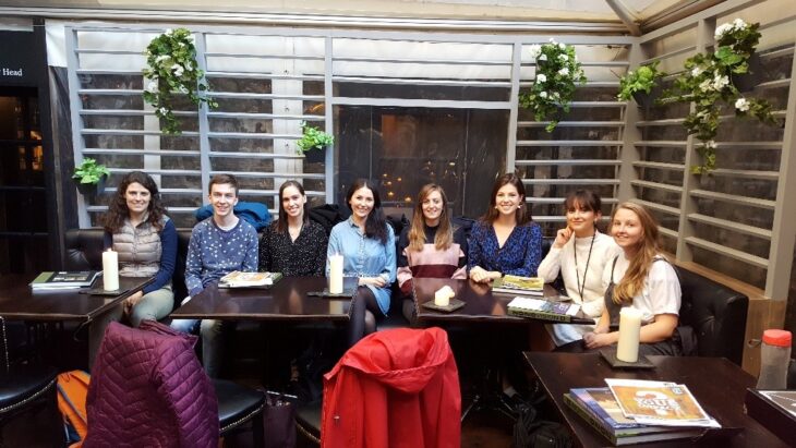 The Scottish Wildlife Trust's Young Leaders sat at a table celebrating the launch of the group in 2018.